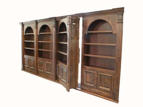 open wooden bookcase door.