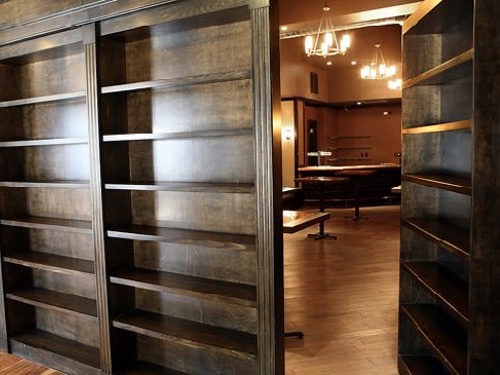 open single wooden bookcase door