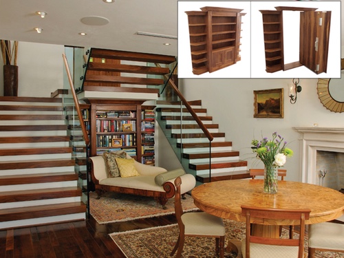 closed single bookcase door between stairs.