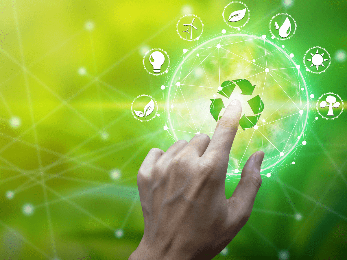 hand touching recycling graphics.