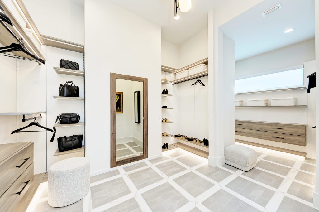 vault mirror door in walk in closet