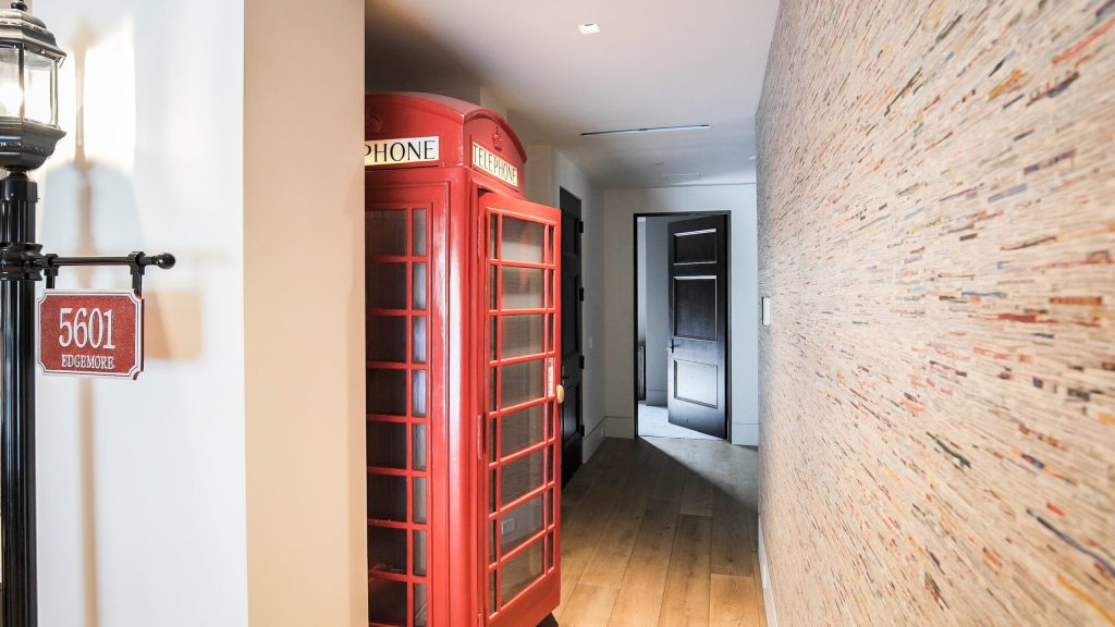 open phone booth secret door