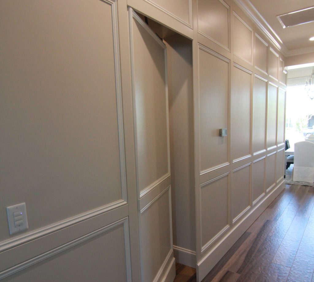 white panel hidden door