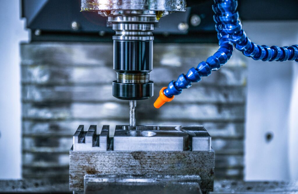 CNC lathe milling machine cutting a high precision metal part