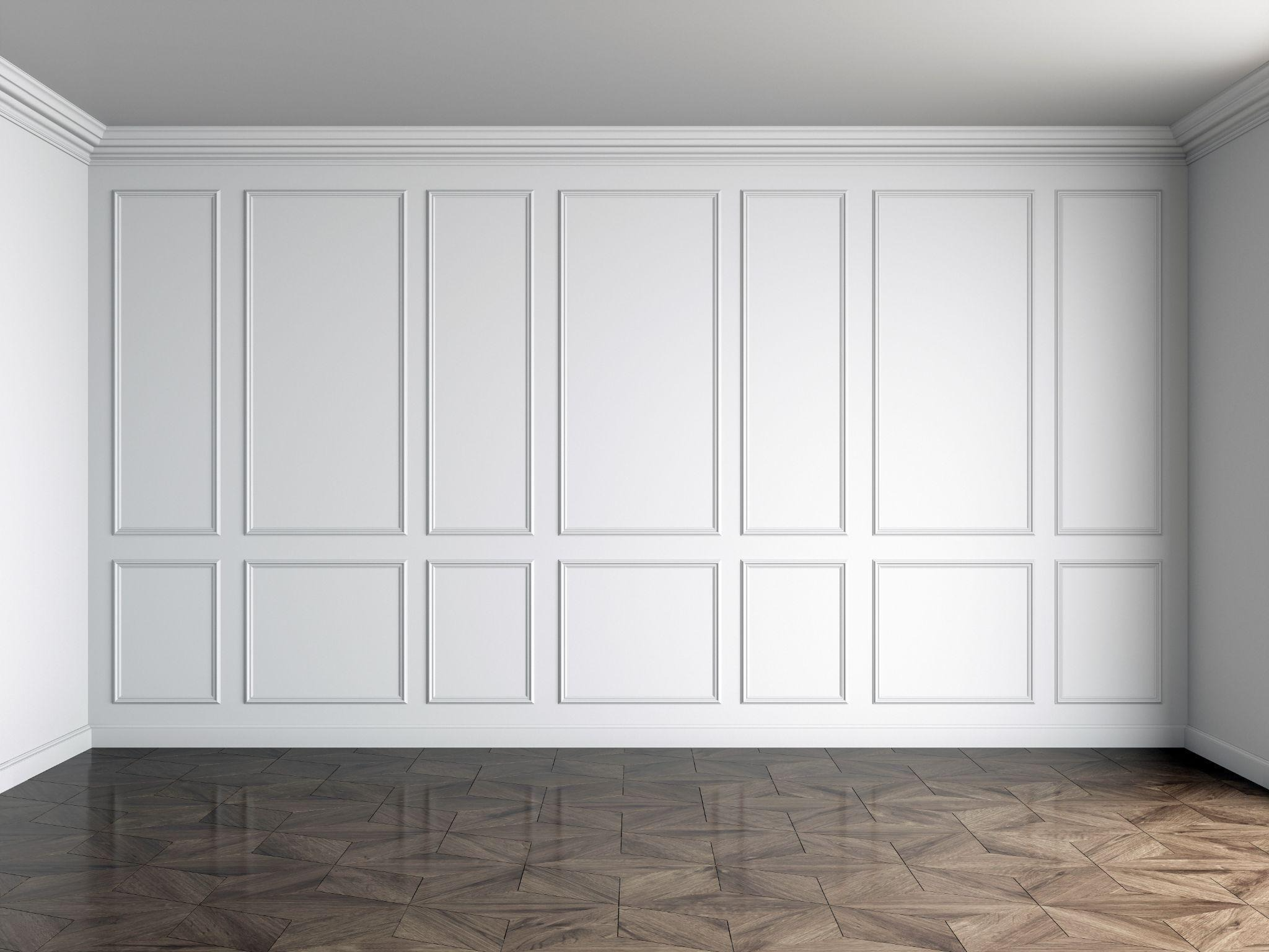 White wall panels with wood flooring, modern interior backdrop.
