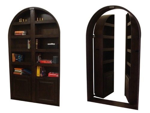 Arched hidden bookcase door opening to a secret room.